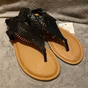 IYNX Sandals Women’s Size‎ 7.5 Black Eyelet Buckle New With Tags Has Flaw